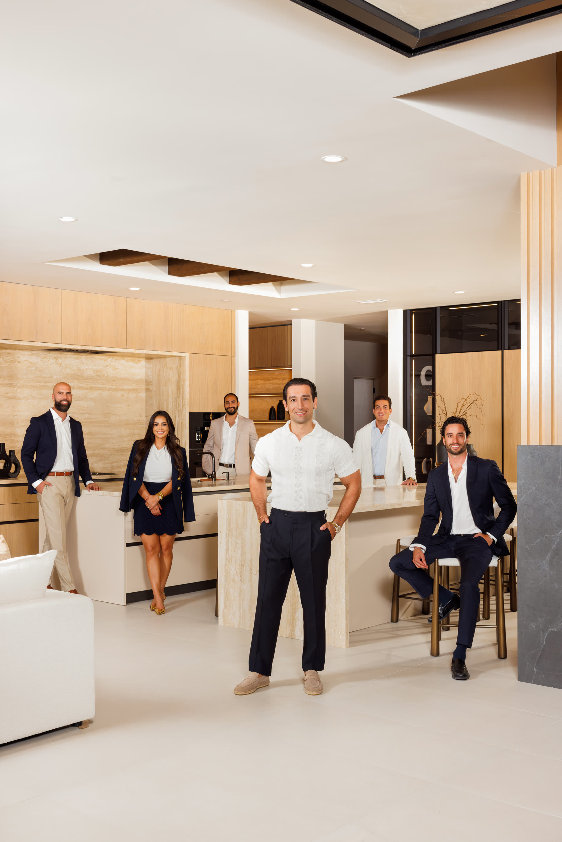 Preston Dubreville with the studio team